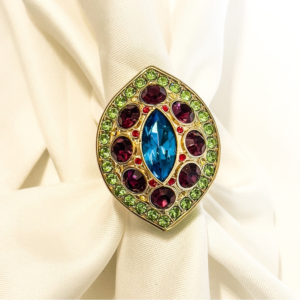 Akkad brand colorful statement gold ring.